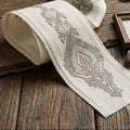 Paisley drop embroidered trim swatch by Venia Home