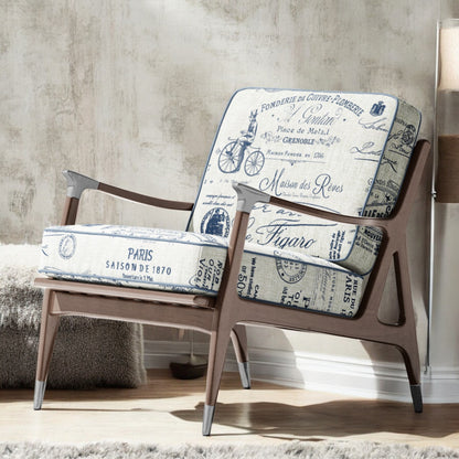 Midnight blue Parisian script fabric on an accent chair