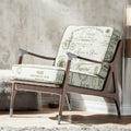 Olive green Parisian script fabric on an accent chair