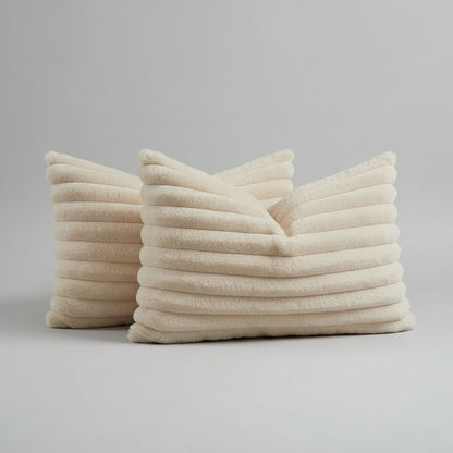 Close-up detail of beige plush ridges faux fur fabric