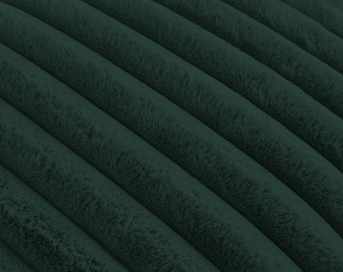 Texture of emerald plush ridges faux fur fabric