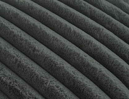 Texture of onyx noir plush ridges faux fur fabric