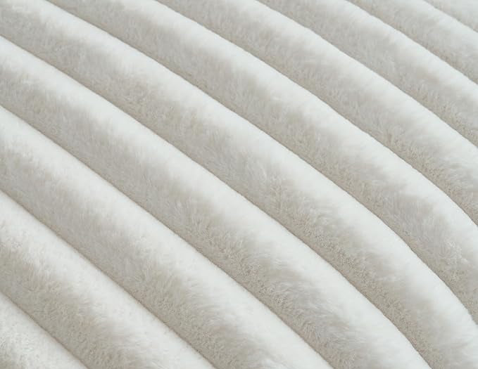 Texture of pearl plush ridges faux fur fabric