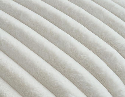 Texture of pearl plush ridges faux fur fabric