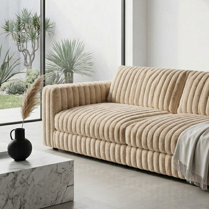 Close-up detail of taupe plush ridges faux fur fabric