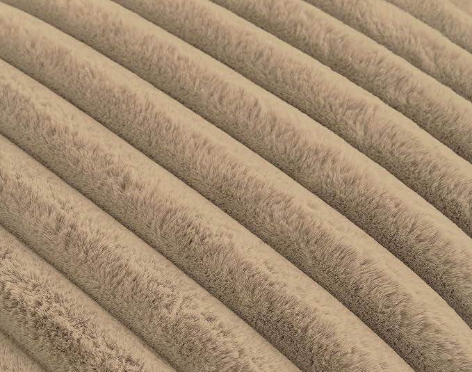 Texture of taupe plush ridges faux fur fabric