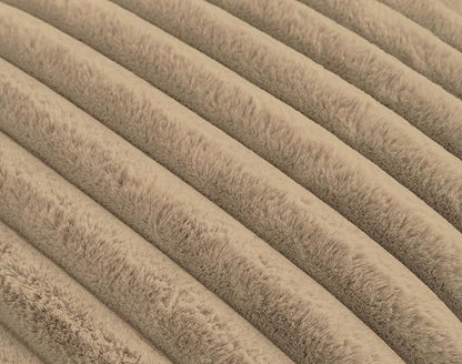 Texture of taupe plush ridges faux fur fabric