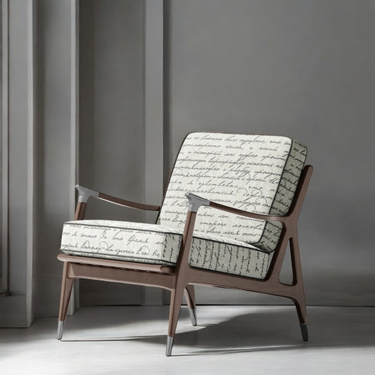 Charcoal Poet's Letter fabric on an accent chair