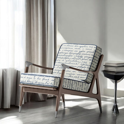 Midnight blue Poet's Letter fabric on an accent chair