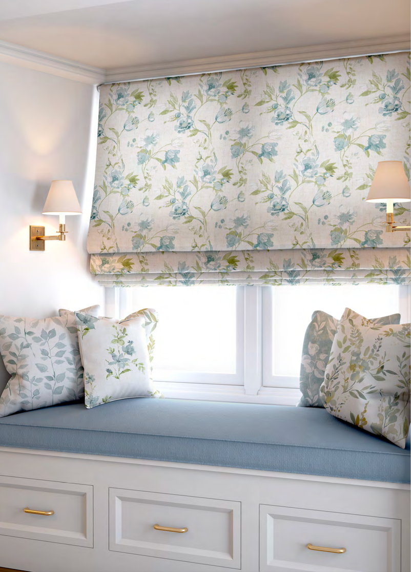 Close-up detail of cream romance bloom fabric with aqua flowers