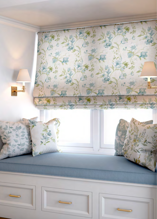 Close-up detail of cream romance bloom fabric with aqua flowers
