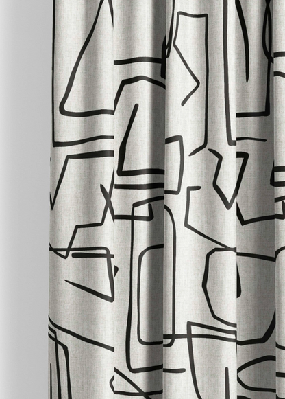 Close-up detail of ivory and black sketch lines fabric