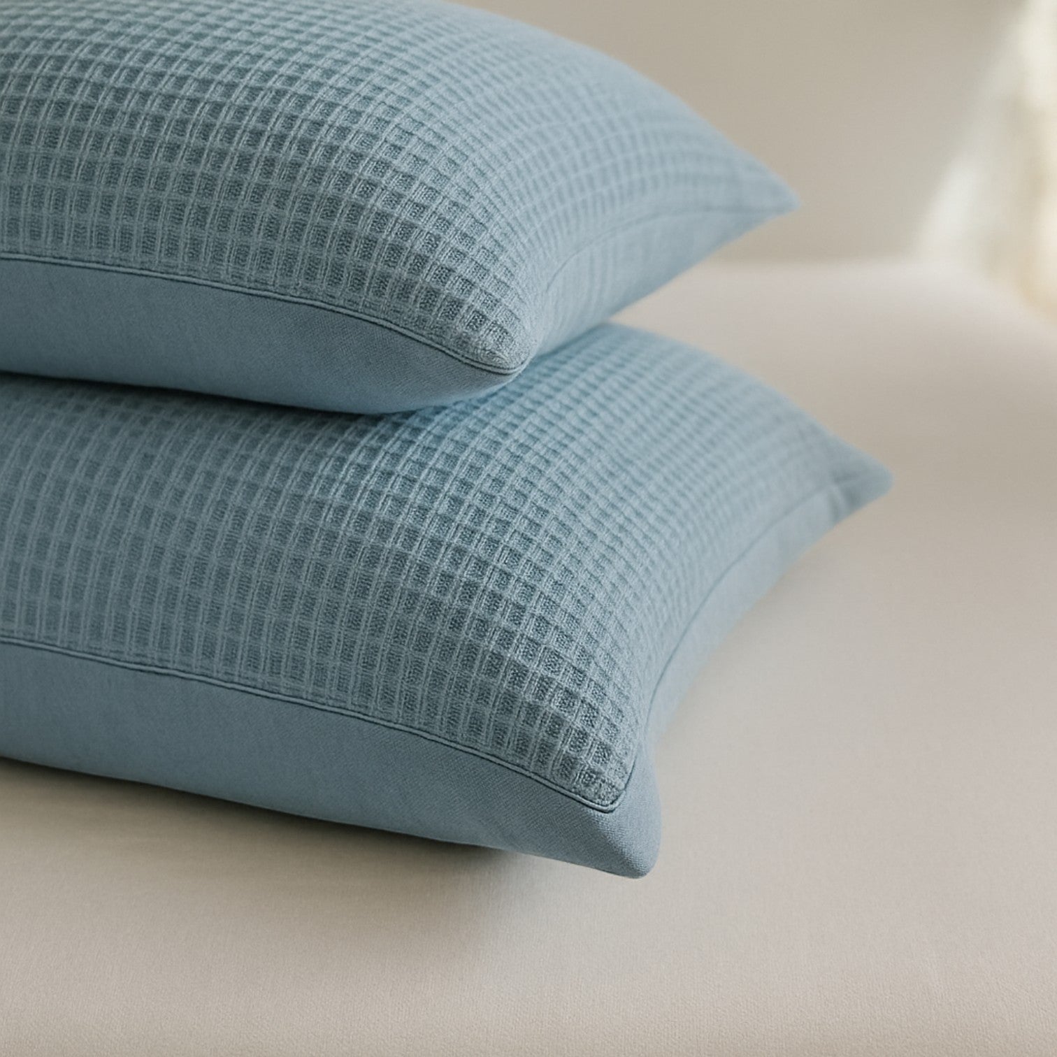 Yasmin waffle blanket and bedspread styled on a bed