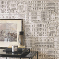 an office wall adorned with a grey wallpaper