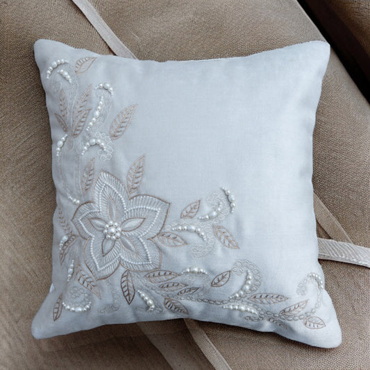 elegant embroidered cushion cover with pearls, ideal for enhancing living room